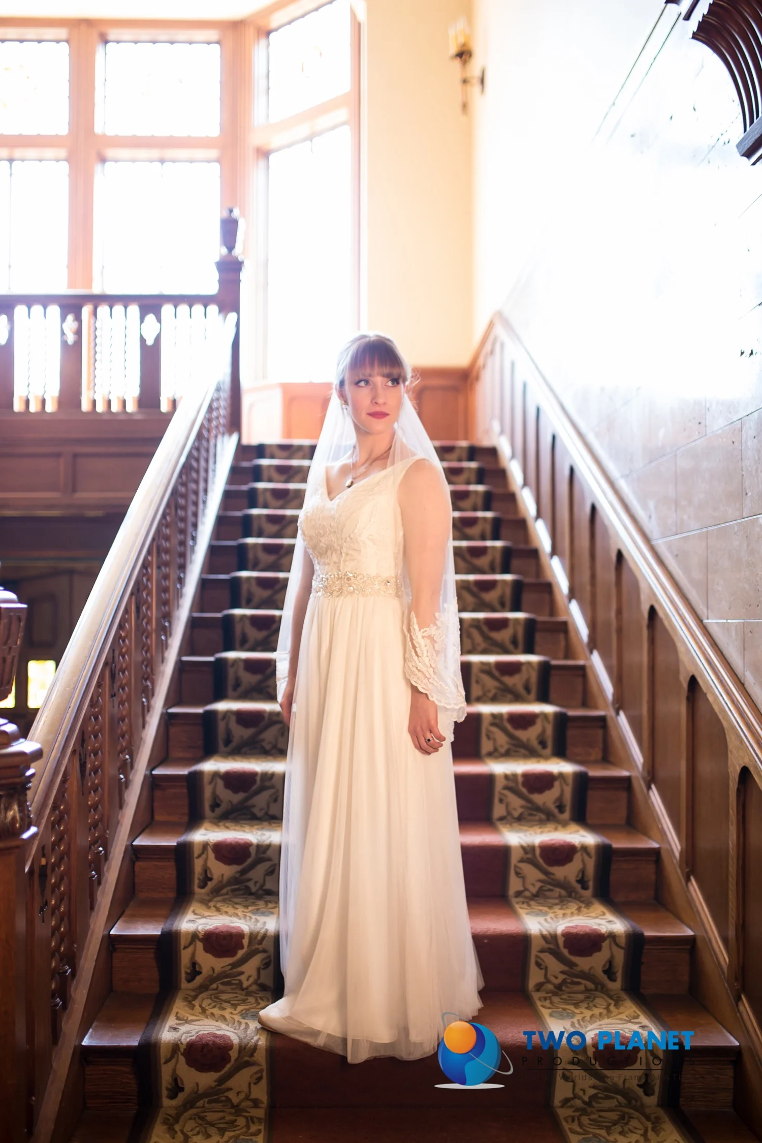 Bridal Couture by Sonni custom lace wedding dress Amelia stairway